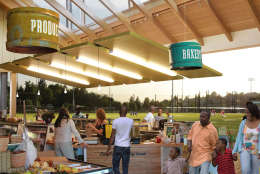 The view from inside the market hall looking out at the athletic fields. (Courtesy: OMA/Events DC)