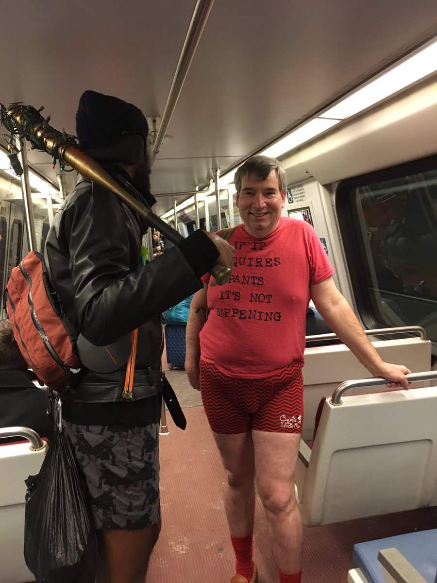 A Metro rider explains that the inspiration for his constume came from "The Walking Dead" TV series. (WTOP/Liz Anderson)