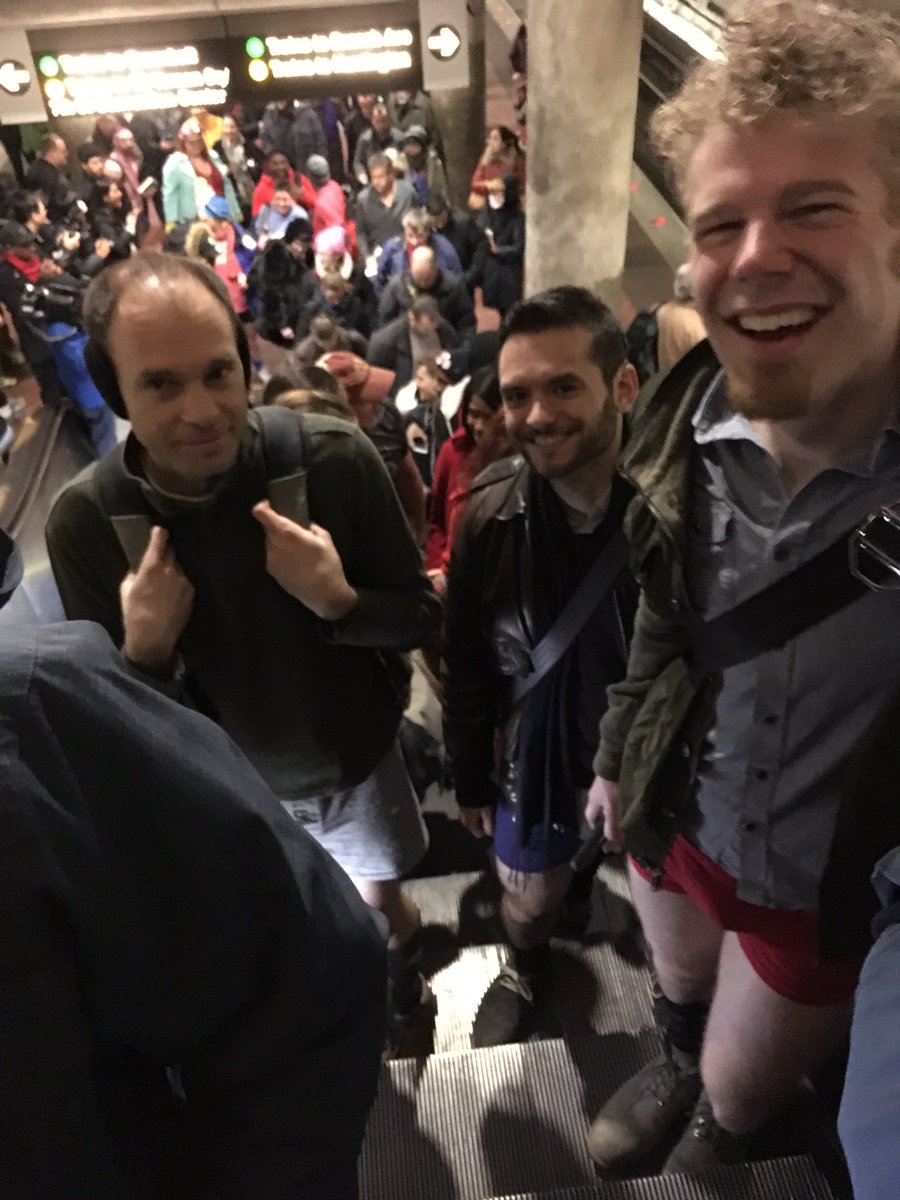 Transit riders from dozens of cities around the globe -- including the ones shown here in D.C. -- participated in No Pants Subway Ride on Jan. 8, 2017. (WTOP/Liz Anderson)