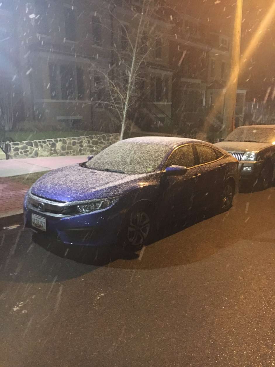 "The snow is real!" Outside the WTOP studios in Northwest D.C. at about 1 a.m. (WTOP/Keara Dowd)
