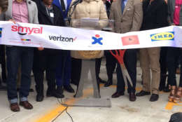 Photo of DC Mayor Muriel Bowser before cutting ribbon