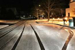 Snow on the side streets in Loudoun County, Virginia. (WTOP/Neal Augenstein)