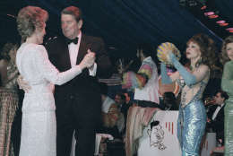 U.S.President Ronald Reagan and wife Nancy Reagan shown dancing at the inaugural ball on Jan. 21, 1985 in the Washington Hilton. Also with others, views of stage, etc. (AP Photo/IS)