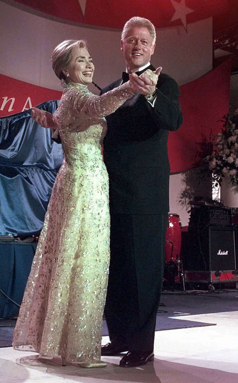 President Clinton and his wife, first lady Hillary Clinton, dance at the New England Ball Monday, Jan. 20, 1997, in Washington. (AP Photo/J. Scott Applewhite)