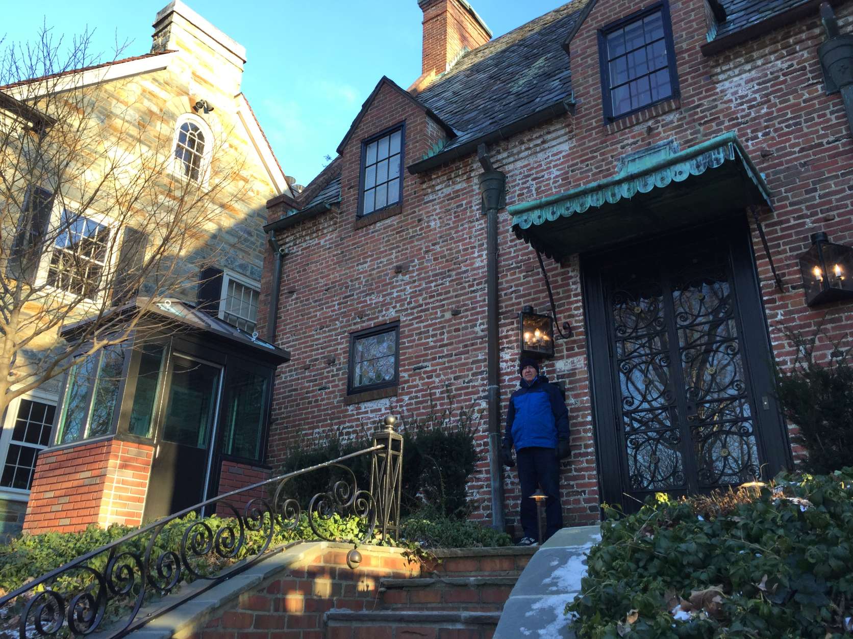 "Oh wow dad; you'll be famous now," neighbor Lester Brown said his daughter exclaimed upon learning the Obamas were moving onto his street. Note the newly installed security booth pictured to the left of the front door. (WTOP/Kristi King)