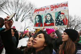 Protesters attend the Women's March on Washington on January 21, 2017 in Washington, DC. Large crowds are attending the anti-Trump rally a day after U.S. President Donald Trump was sworn in as the 45th U.S. president.  (Photo by Mario Tama/Getty Images)