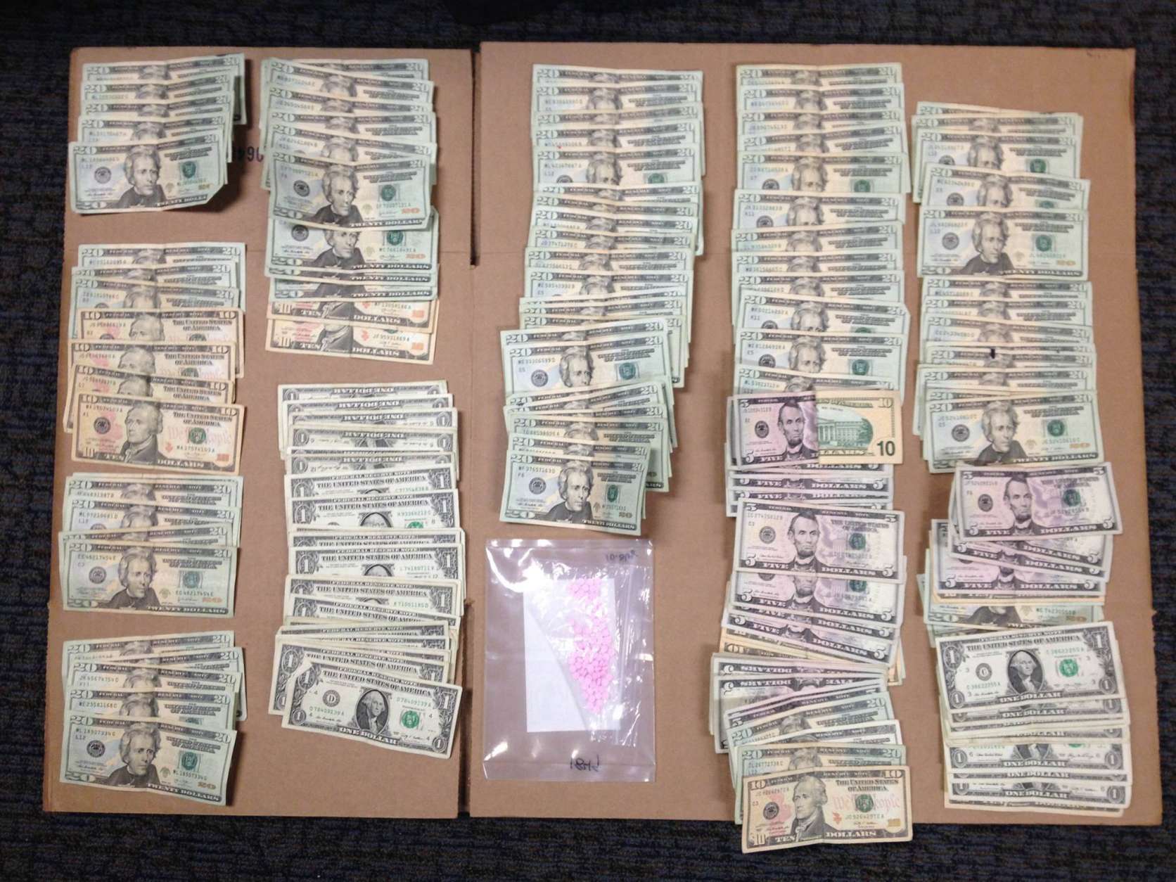 Anne Arundel County Detectives from the Western Tactical Patrol Unit recovered ninety 10mg oxycodone pills and more than $2,000 cash during a traffic stop on March 31, 2016. The suspect was traveling southbound 295 near Route 32 in Laurel when he threw a baggie out the passenger side window. Detectives also seized a 5 inch steak knife. The charges against the suspect include possession with the intent to distribute and multiple traffic charges. (Courtesy Anne Arundel County Police)