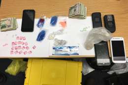 Anne Arundel Detectives from the Northern District Tactical Narcotics Team executed a warrant for a Pasadena home in March 2016 after a narcotics trafficking investigation. Detectives seized more than 11 grams of cocaine, more than 6 grams of raw heroin, 19 baggies of heroin, 19 oxycodone tablets, 3 alprazolam tablets, 2 Suboxone strips and more than $500 cash. Two suspects were charged with possession with the intent to distribute. (Courtesy Anne Arundel County Police)