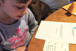 Michele Threefoot, 8, woke up Friday December 30 to find two notes from her superhero, Justice Ginsburg. (Courtesy Threefoot family)