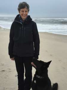 D.C. resident Mary Klein, pictured here on the beach with her German shepherd, Adina. is taking joy in what’s left of her life. (Courtesy Mary Klein)