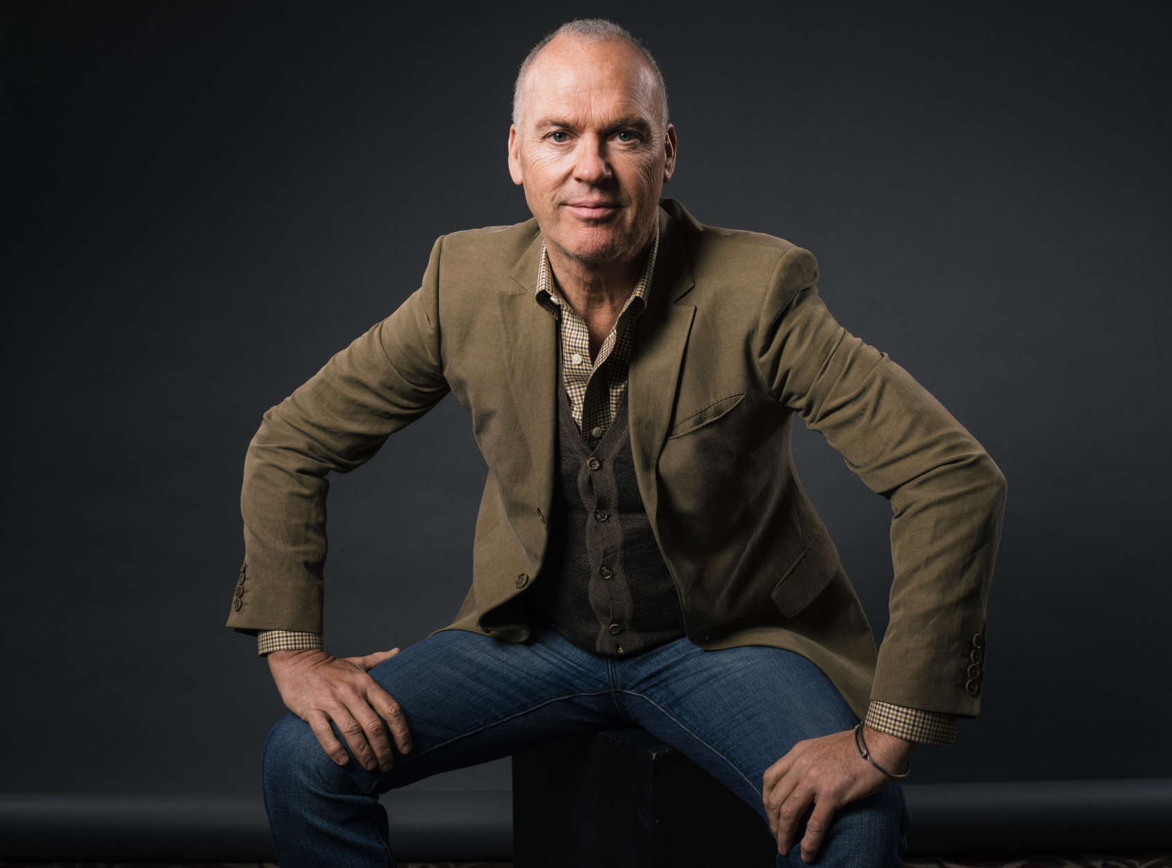 Michael Keaton poses for a portrait during press day for "Spotlight" at The Four Seasons on Wednesday, Nov. 4, 2015, in Los Angeles. Keaton portrays Walter "Robby" Robinson in the movie which opens in U.S. theaters on Nov. 6, 2015.  (Photo by Casey Curry/Invision/AP)