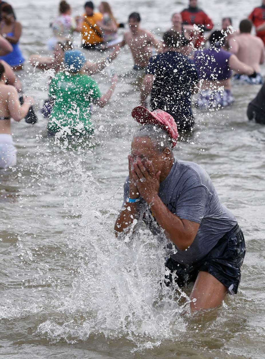 Despite the biting cold, swimmers splashed their way into the Chesapeake to raise money for Special Olympics Maryland. (Courtesy Steve Ruark for Special Olympics Maryland)
