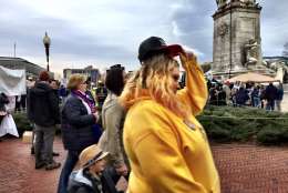 Trump supporters file past protesters underneath a cloudy sky the morning of Inauguration Day.
(Courtesy Cami McCormick)