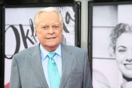 Robert Osborne arrives at 2014 TCM Classic Film Festival's Opening Night Gala at the TCL Chinese Theatre on Thursday, April 10, 2014 in Los Angeles. (Photo by Annie I. Bang /Invision/AP)