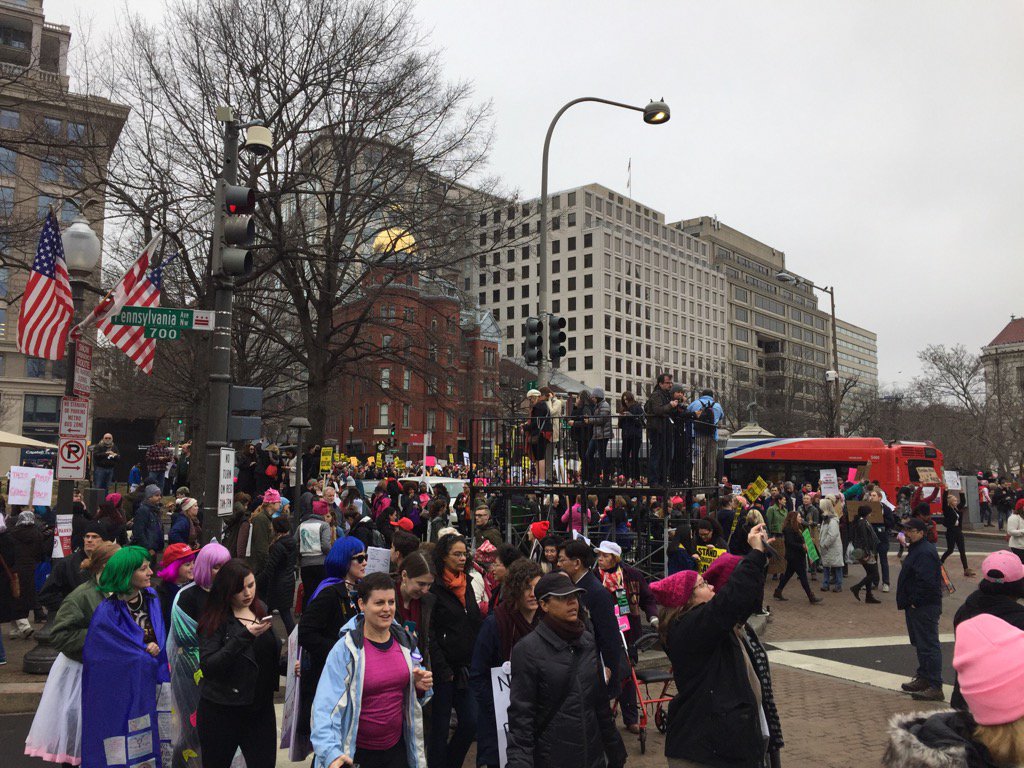Crowds of people gather on Pennsylvania Avenue before the Women's March on Washington Saturday, Jan. 21, 2017. (WTOP/Rob Woodfork)