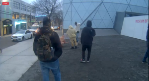 Actor Shia LaBeouf sponsors a live participatory art project in front of the  Museum of the Moving Image, Queens, NY. (He Will Not Divide Us/Live Stream) 