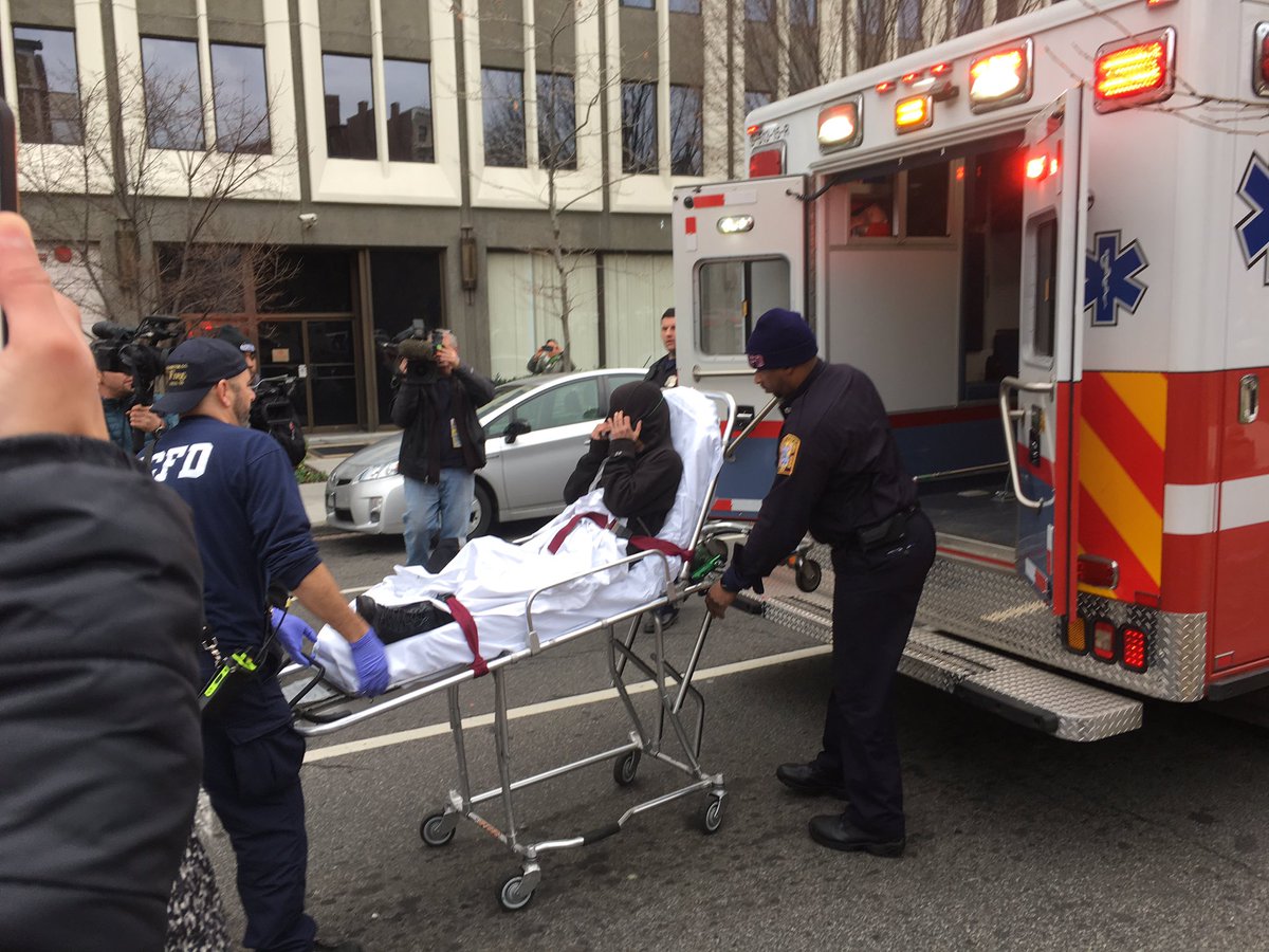 A protester is hospitalized after tear gas is used, and a police officer is treated on scene, WTOP's Mike Murillo reports. (WTOP/Mike Murillo)