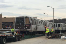 The first retirement of a 4000 Series car came Feb. 15 at Metro's Greenbelt Rail Yards as car 4054 was hauled up onto a flatbed truck and driven to a scrap yard in Baltimore. (WTOP/Max Smith)