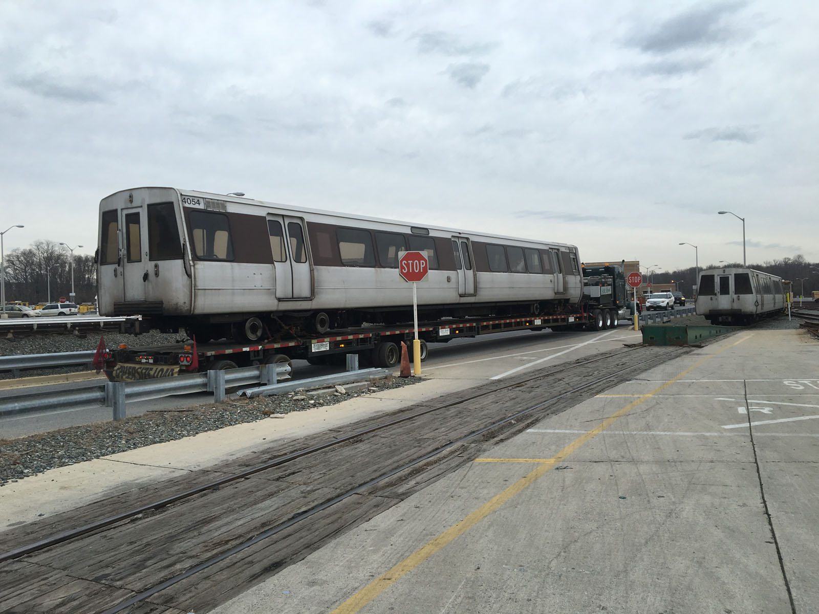 The first retirement of a 4000 Series car came Feb. 15 at Metro's Greenbelt Rail Yards as car 4054 was hauled up onto a flatbed truck and driven to a scrap yard in Baltimore. (WTOP/Max Smith)