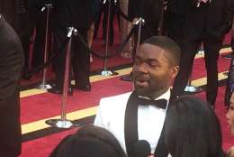 David Oyelowo answers questions on the red carpet. (WTOP/Jason Fraley)