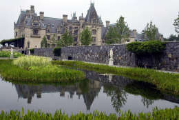 **ADVANCE FOR WEEKEND JULY 16-17**The Biltmore House is reflected in a pond on the estate in Asheville, N.C., Wednesday July 6, 2005. Seventy-five years after it was first opened to the public, George W. Vanderbilt's grand Biltmore House is showing off a new side. Ten rooms on the house's fourth floor _ including several that housed the servants who kept the 250-room house running _ have been restored and opened to the public for the first time. (AP Photo/Chuck Burton)