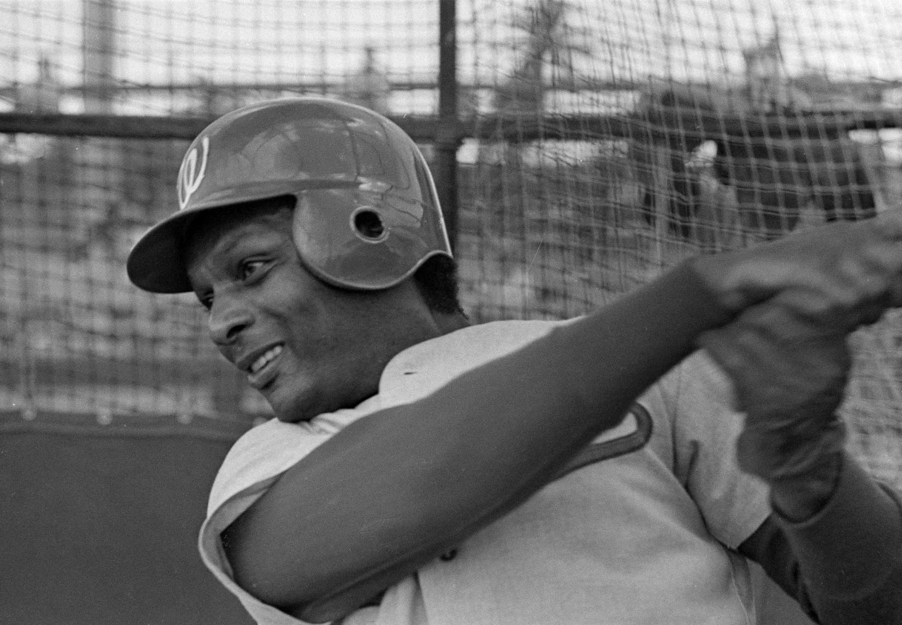 Curt Flood, who recently joined the Washington Senators after a year's absence from baseball, has a turn in the batting cage at the team's spring training camp in Pompano Beach, Fla., Feb. 23, 1971. (AP Photo/Robert Houston)