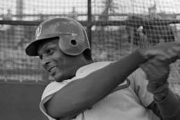 Curt Flood, who recently joined the Washington Senators after a year's absence from baseball, has a turn in the batting cage at the team's spring training camp in Pompano Beach, Fla., Feb. 23, 1971. (AP Photo/Robert Houston)