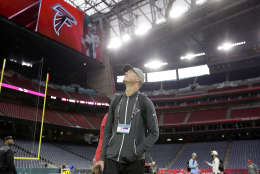 Atlanta Falcons quarterback Matt Ryan looks around the field during a walk through at NRG Stadium on the eve of NFL Super Bowl 51 football game Saturday, Feb. 4, 2017, in Houston. Atlanta will face the New England Patriots in the Super Bowl Sunday. (AP Photo/Eric Gay)