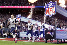 New England Patriots' Tom Brady runs on the field with teammates before the NFL Super Bowl 51 football game against the Atlanta Falcons Sunday, Feb. 5, 2017, in Houston. (AP Photo/Darron Cummings)