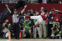 Atlanta Falcons' Devonta Freeman dives in the end zone after scoring a touchdown during the first half of the NFL Super Bowl 51 football game Sunday, Feb. 5, 2017, in Houston. (AP Photo/Matt Slocum)