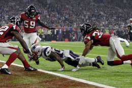 New England Patriots' James White gets into the end zone for a touchdown during the second half of the NFL Super Bowl 51 football game against the Atlanta Falcons Sunday, Feb. 5, 2017, in Houston. (AP Photo/David J. Phillip)