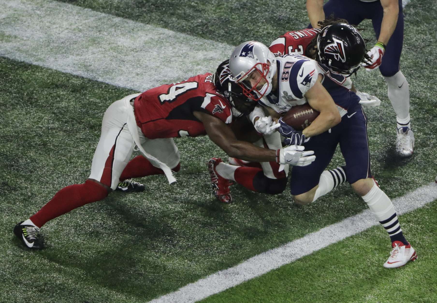 New England Patriots' Danny Amendola scores on a two point conversion during the second half of the NFL Super Bowl 51 football game against the Atlanta Falcons, Sunday, Feb. 5, 2017, in Houston. (AP Photo/Charlie Riedel)