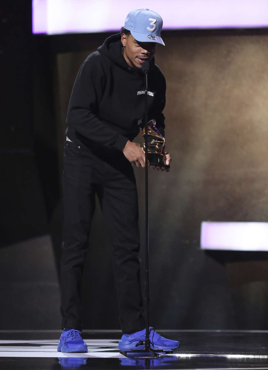 Chance The Rapper accepts the award for best rap performance for "No Problem" at the 59th annual Grammy Awards on Sunday, Feb. 12, 2017, in Los Angeles. (Photo by Matt Sayles/Invision/AP)