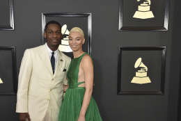 Leon Bridges, left, and Brittni Jessie arrive at the 59th annual Grammy Awards at the Staples Center on Sunday, Feb. 12, 2017, in Los Angeles. (Photo by Jordan Strauss/Invision/AP)