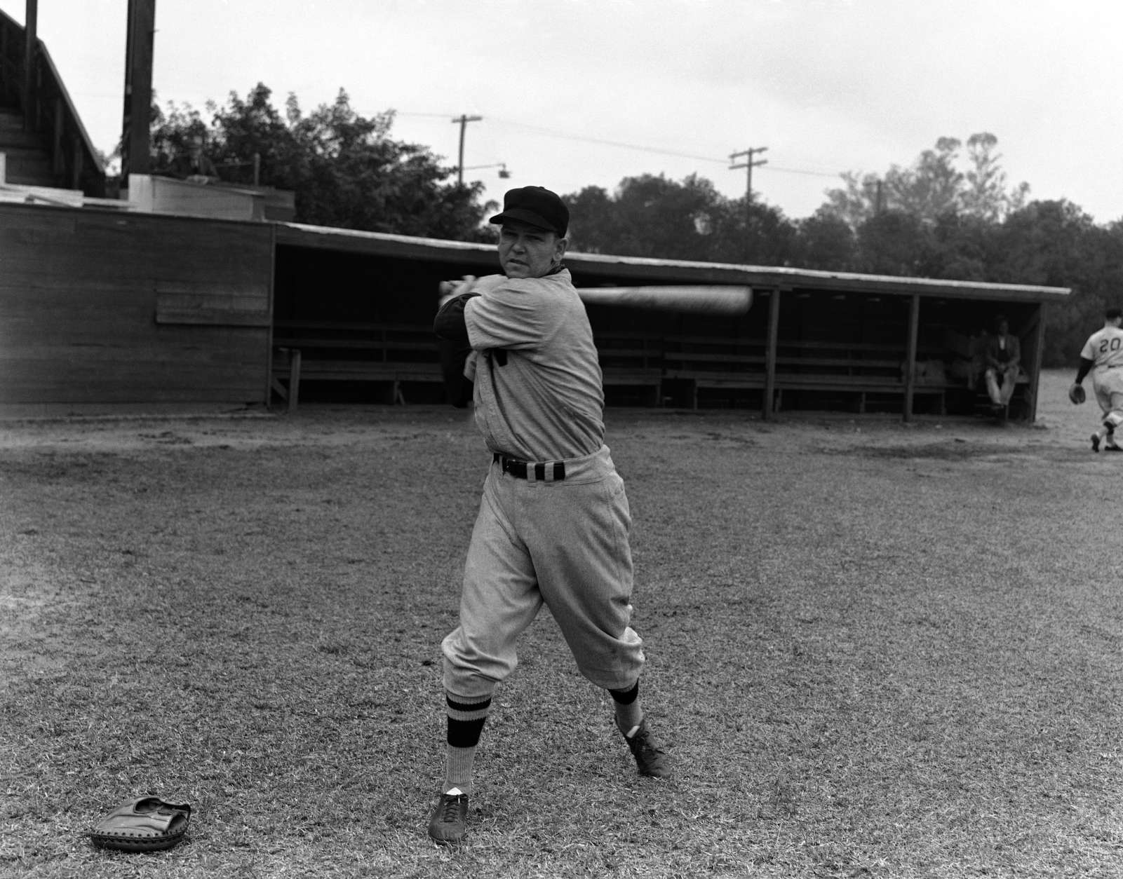 Jake Early, catcher with the Washington Senators, swings a bat in loosening up at the clubs Orlando, Fla., spring training camp, Feb. 24, 1942.  (AP Photo)