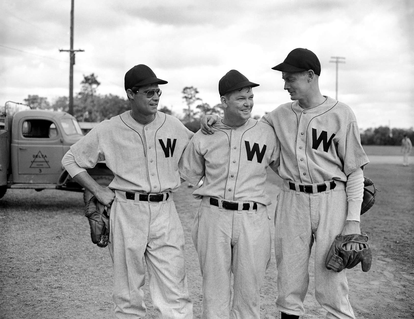 Three veterans of the World War stop to chat as the Washington Senators open their spring training at Orlando, Florida on Feb. 19, 1946. From left to right are Walter Masterson, pitcher, of Washington, D.C., Danny Reagan, catcher, of Los Angeles, Calif., and Sidney Hudson, pitcher, of Chattanooga, Tennessee. (AP Photo)