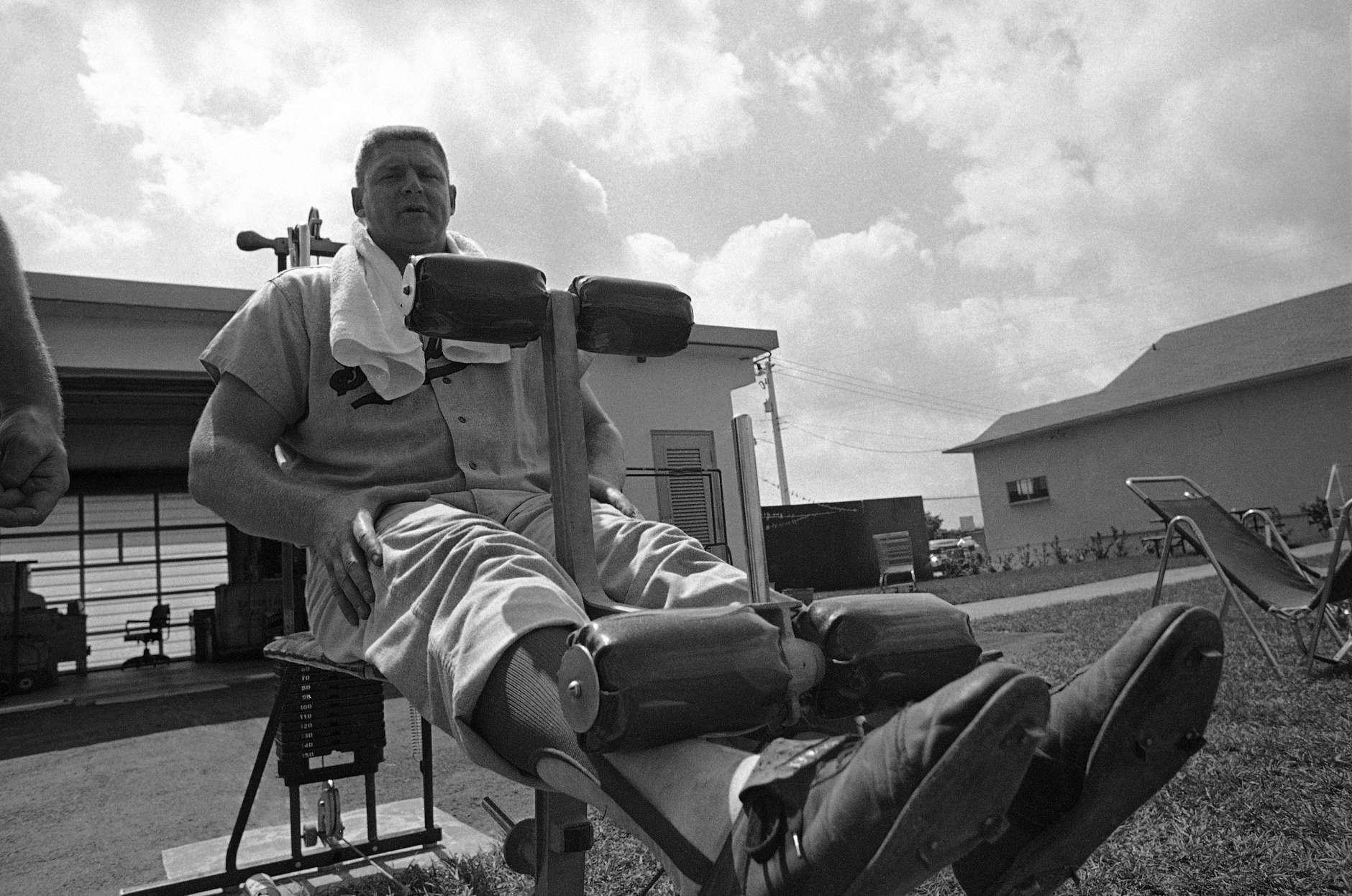 Frank Howard, of Washington Senators giant outfielder, tests the latest in spring training devices during his workout in camp in Pompano Beach, Florida on March 2, 1971. The outdoor gym is designed to strengthen legs and arms and body. Howard signed his new contract on Monday. (AP Photo)
