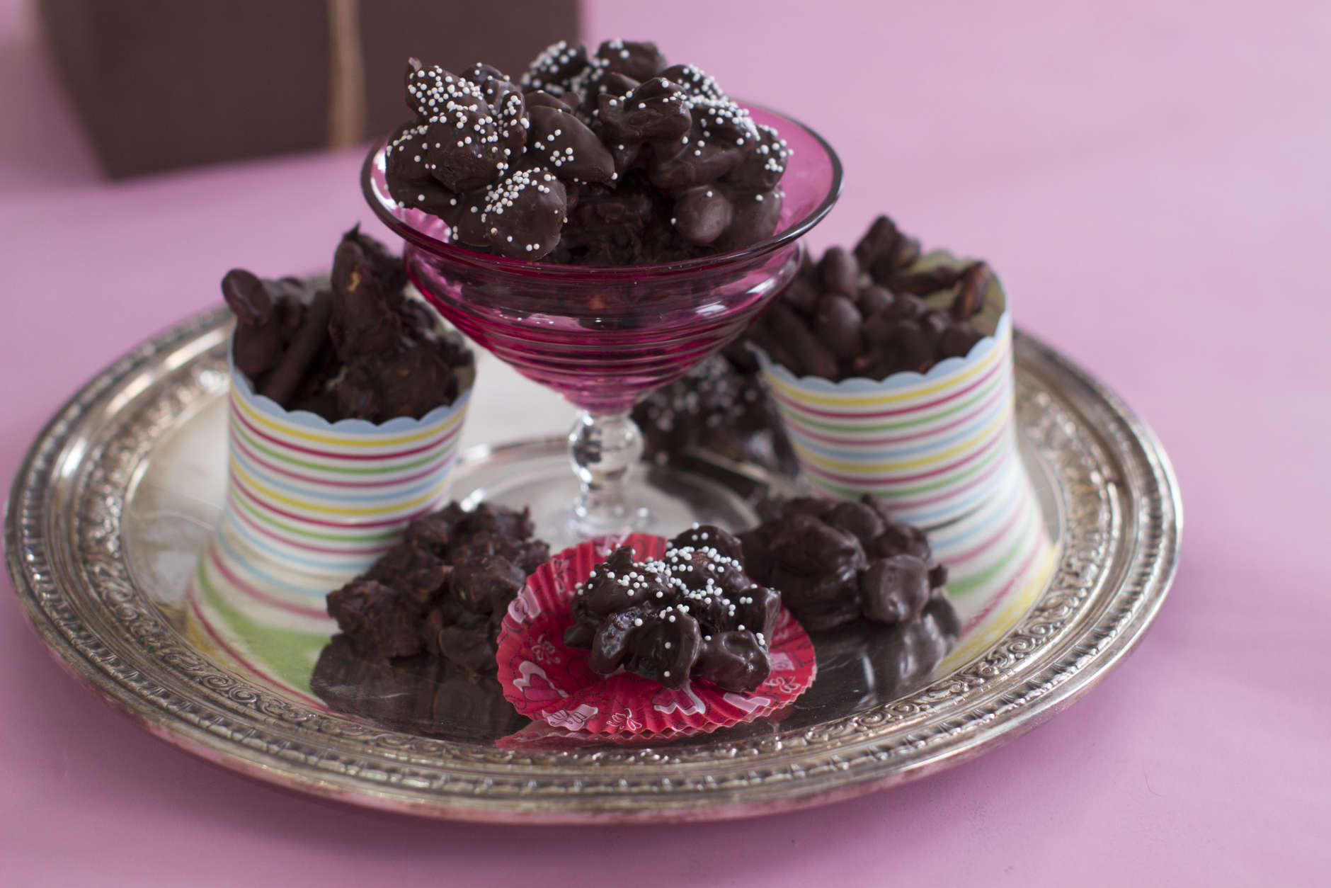 This Jan. 12, 2015 photo shows chocolate candy clusters in Concord, N.H. This is from a recipe by Elizabeth Karmel. (AP Photo/Matthew Mead)