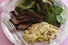 This Jan. 13, 2014 photo shows cocoa butter date polenta and cocoa coffee flank steak in Concord, N.H. (AP Photo/Matthew Mead)