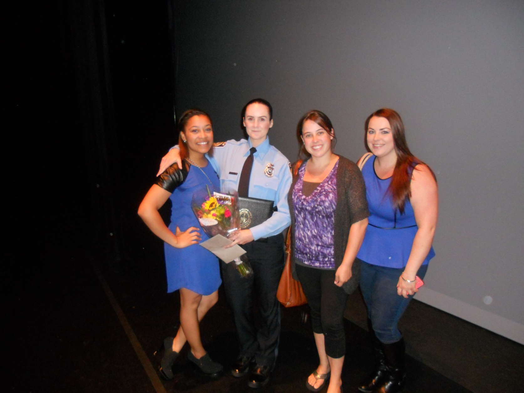 Ashley Guindon (second from left) is pictured with friends at the Police Academy Graduation. (Courtesy Stephanie Guindon)