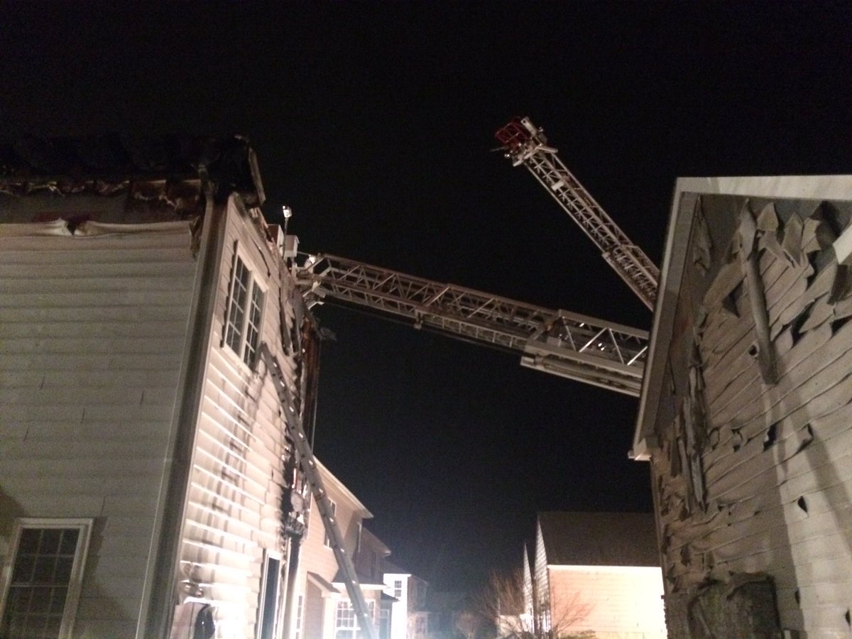 The houses on either side face heat damage. (Courtesy Pete Piringer/Montgomery County Fire & Rescue)