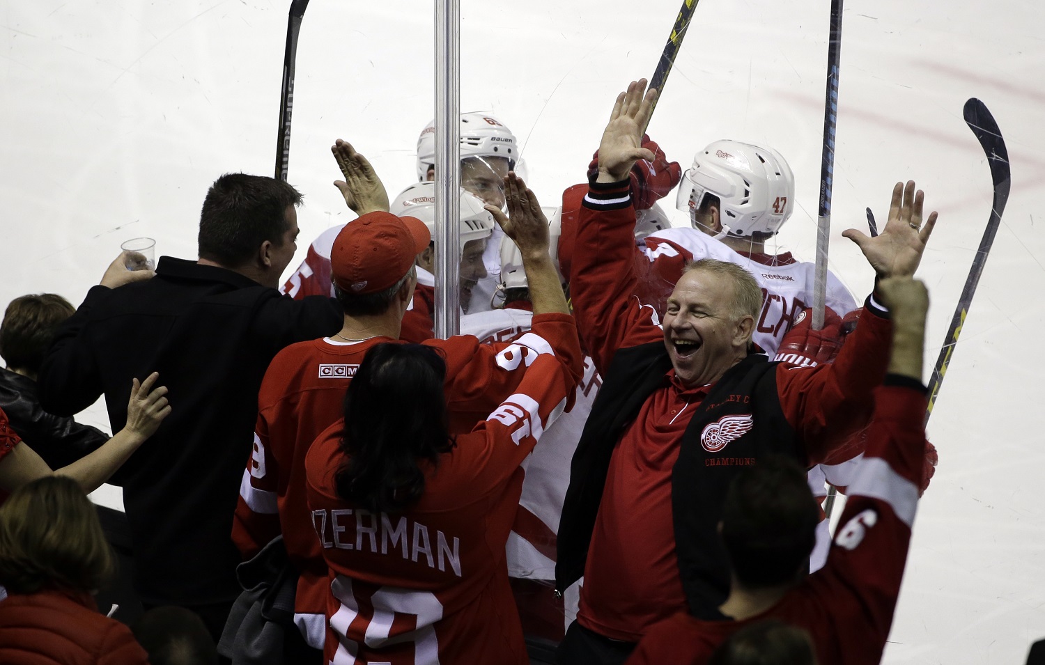 Fans celebrate a goal by Detroit Red Wings' Justin Abdelkader during the third period of an NHL hockey game against the San Jose Sharks Thursday, Jan. 7, 2016, in San Jose, Calif. Detroit won 2-1. (AP Photo/Marcio Jose Sanchez)