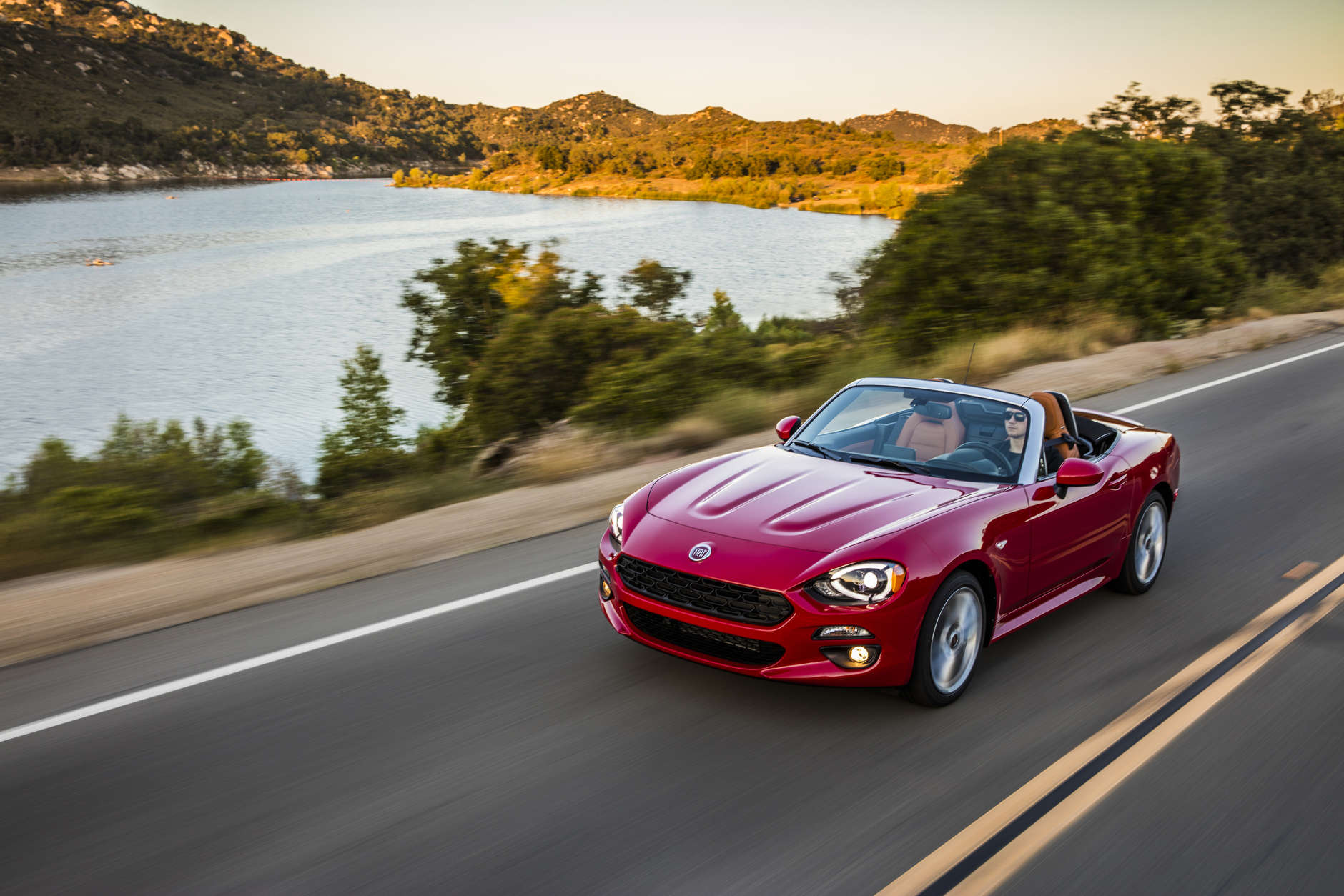 Fiat 124 Spider Abarth, $28,195
When Fiat announced they were resurrecting the classic 124 Spider, many enthusiasts were ecstatic. When the firm announced the architecture would be shared with the Mazda Miata, which made last year's Hot List, roadster fans knew they were in for a treat. With a 0 to 60 mph sprint in a healthy 6.3 seconds, the 124 Spider provides more power than its cousin through a MultiAir turbo engine with true Italian verve.
