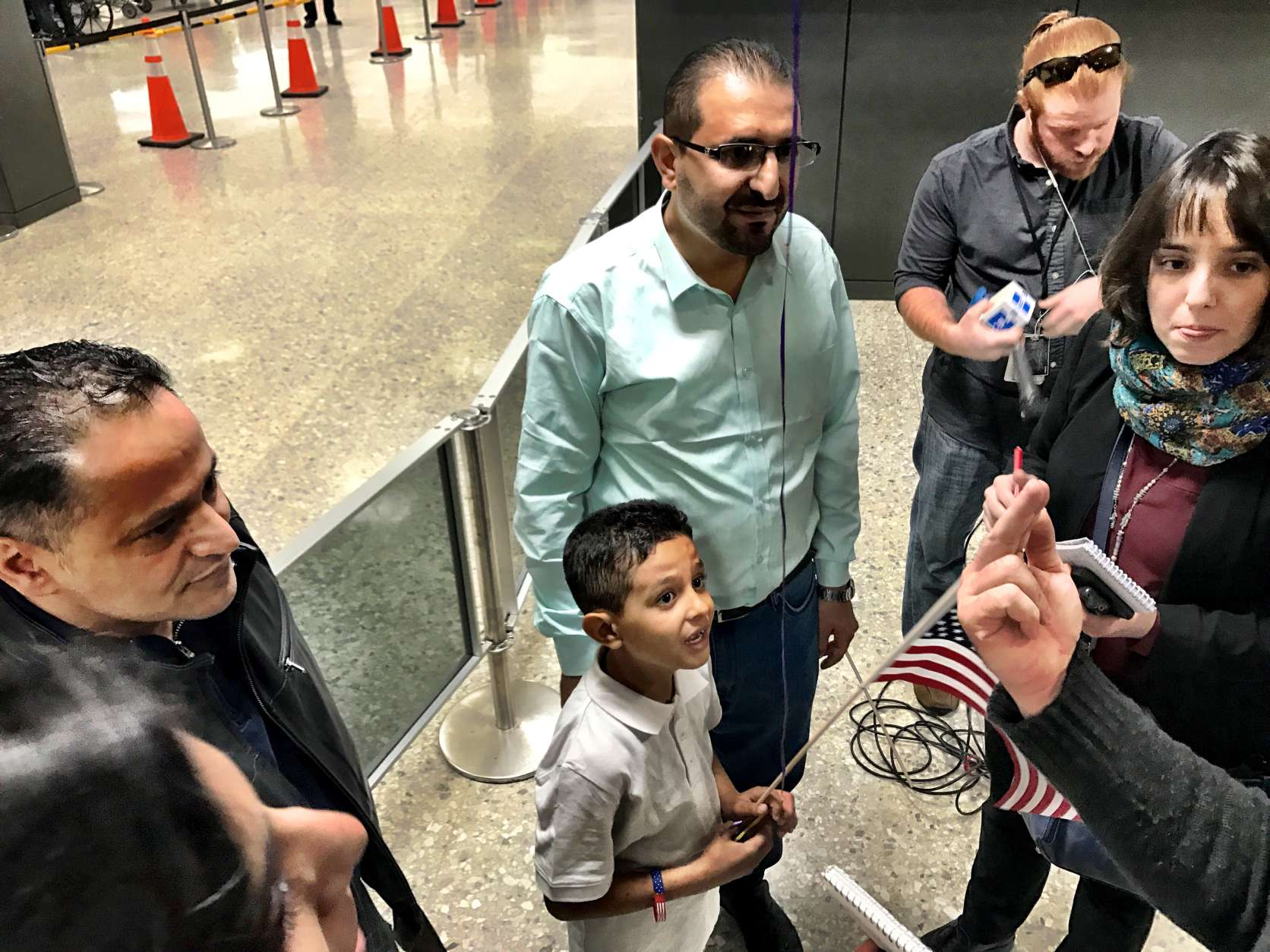 Ibrahim Al Murisi and his son are in the United States for the first time. (WTOP/Neal Augenstein)
