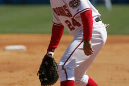VIERA, FL - MARCH 1:  First baseman Nick Johnson #24 of the Washington Nationals awaits action against the New York Mets during MLB Spring Training action at the Space Coast Stadium on March 2, 2005 in Viera, Florida -- the Nationals' first-ever Spring Training game. (Photo by Doug Pensinger/Getty Images)