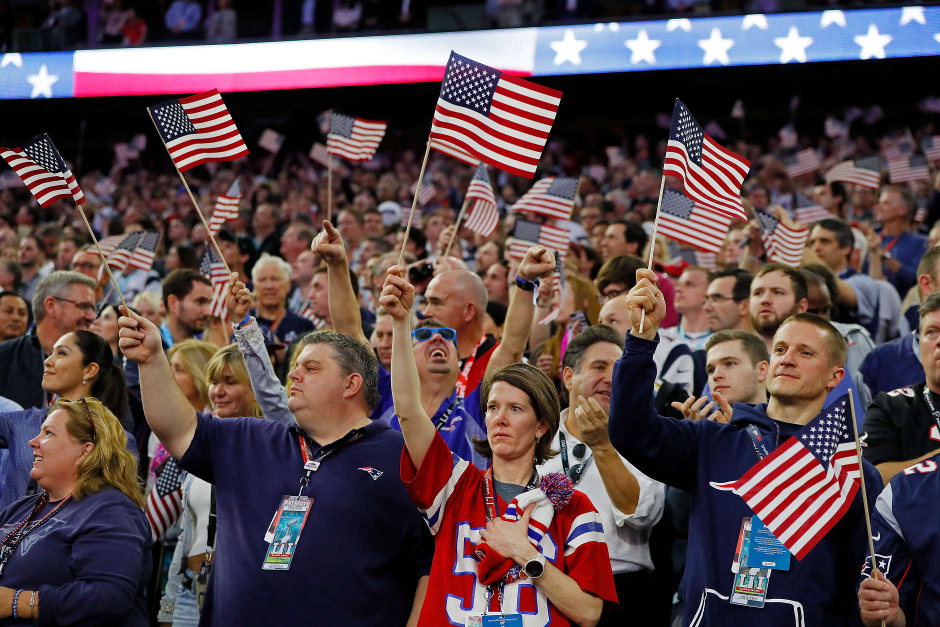 HOUSTON, TX - FEBRUARY 05:  Fans wave American Flags during the National Anthem prior to Super Bowl 51 between the Atlanta Falcons and the New England Patriots at NRG Stadium on February 5, 2017 in Houston, Texas.  (Photo by Kevin C. Cox/Getty Images)
