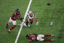 HOUSTON, TX - FEBRUARY 05:  Julian Edelman #11 of the New England Patriots makes a 23 yard catch in the fourth quarter against Robert Alford #23 and Keanu Neal #22 of the Atlanta Falcons during Super Bowl 51 at NRG Stadium on February 5, 2017 in Houston, Texas.  (Photo by Ezra Shaw/Getty Images)