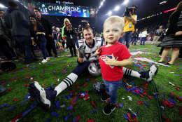 HOUSTON, TX - FEBRUARY 05:  Nate Solder #77 of the New England Patriots celebrates with his son Hudson after defeating the Atlanta Falcons 34-28 in overtime during Super Bowl 51 at NRG Stadium on February 5, 2017 in Houston, Texas.  (Photo by Tom Pennington/Getty Images)
