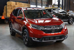 This Wednesday, Oct. 12, 2016, photo shows the 2017 Honda CR-V, in Detroit. America's family car is no longer the Toyota Camry or some other midsize car. It's the Honda CR-V, a compact SUV, that's getting its first overhaul since 2012. (AP Photo/Paul Sancya)