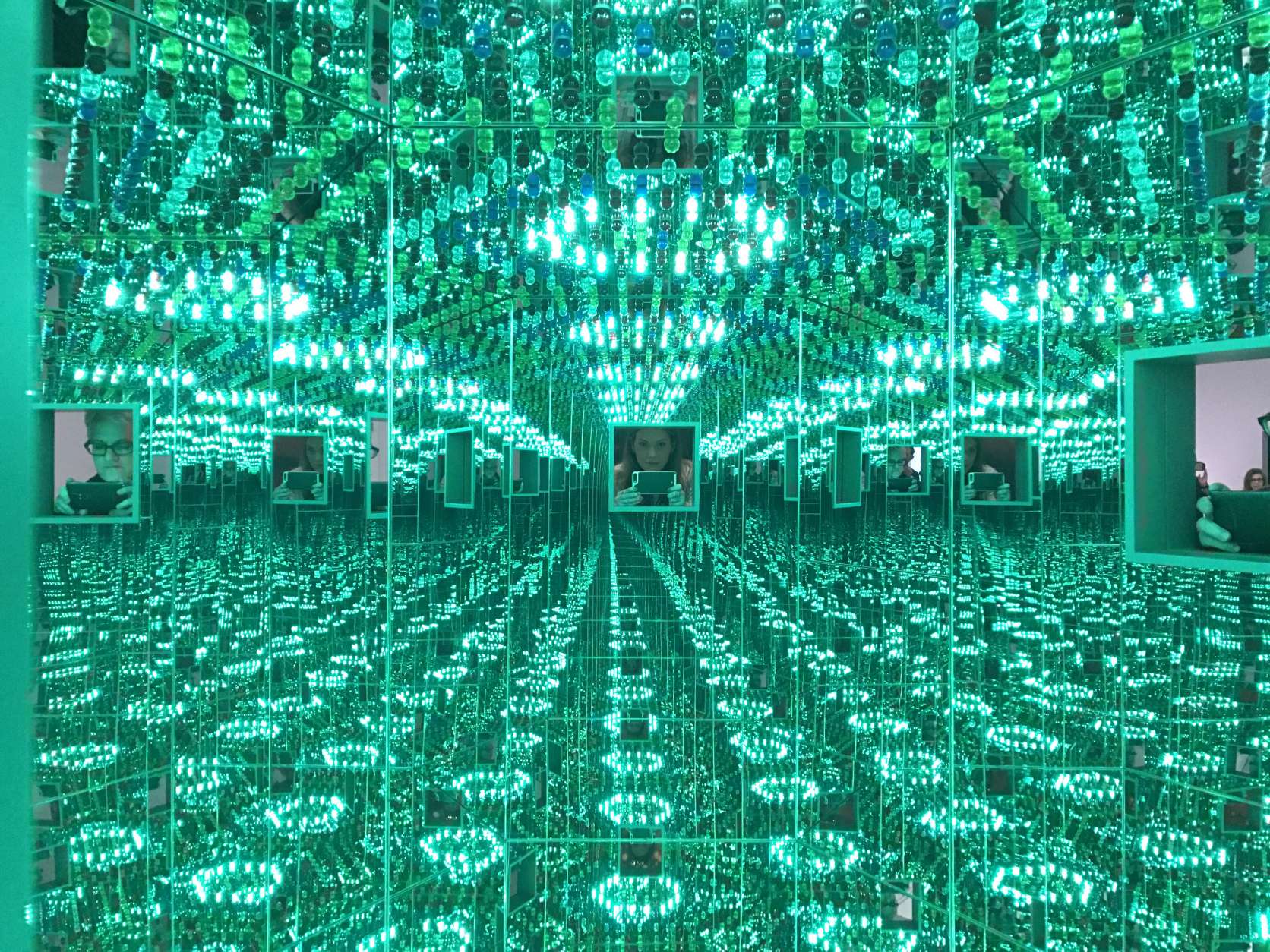 Inside the Inifinity Mirrored Room, Love Forever. There are two installations in this set, one created in 1965 and the other in 1994. (WTOP/Megan Cloherty)